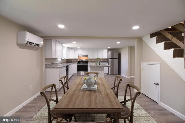 a view of a dining room with furniture