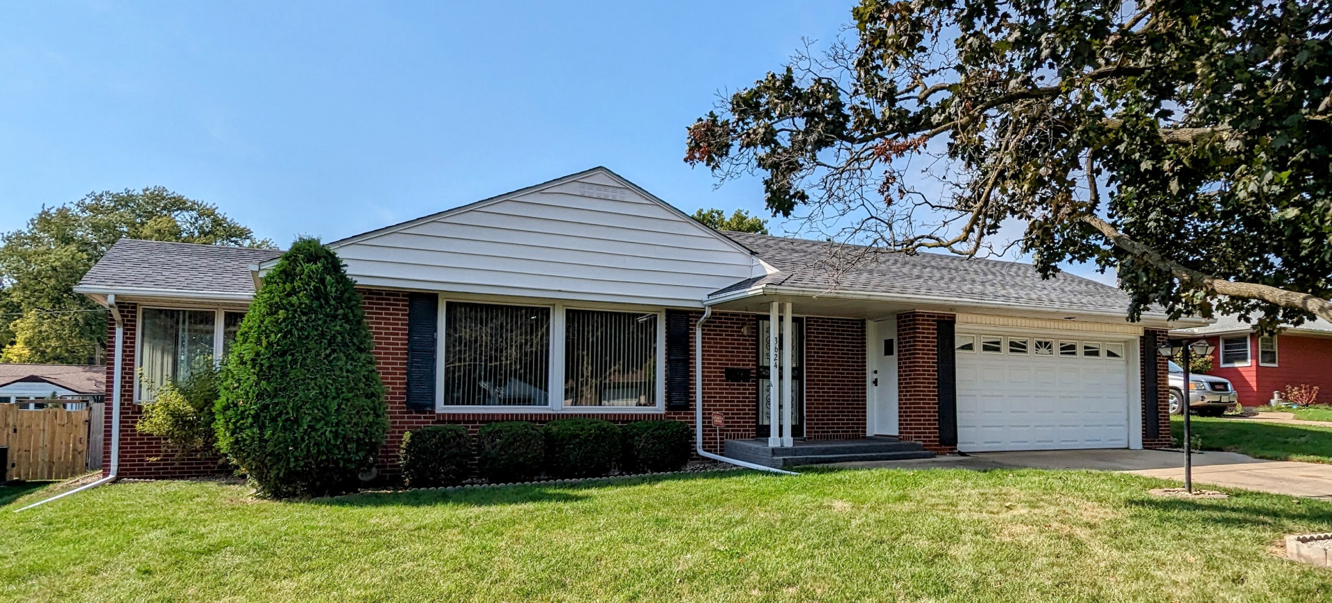 3624 Grant Avenue Rockford, IL 61103 - Photo 1 of 24 a view of front of a house with a yard