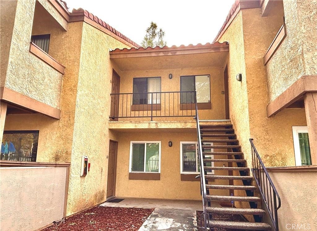 1110 West Blaine Street, Unit 107 Riverside, CA 92507 - Photo 2 of 32 Downstairs Entry to the Right