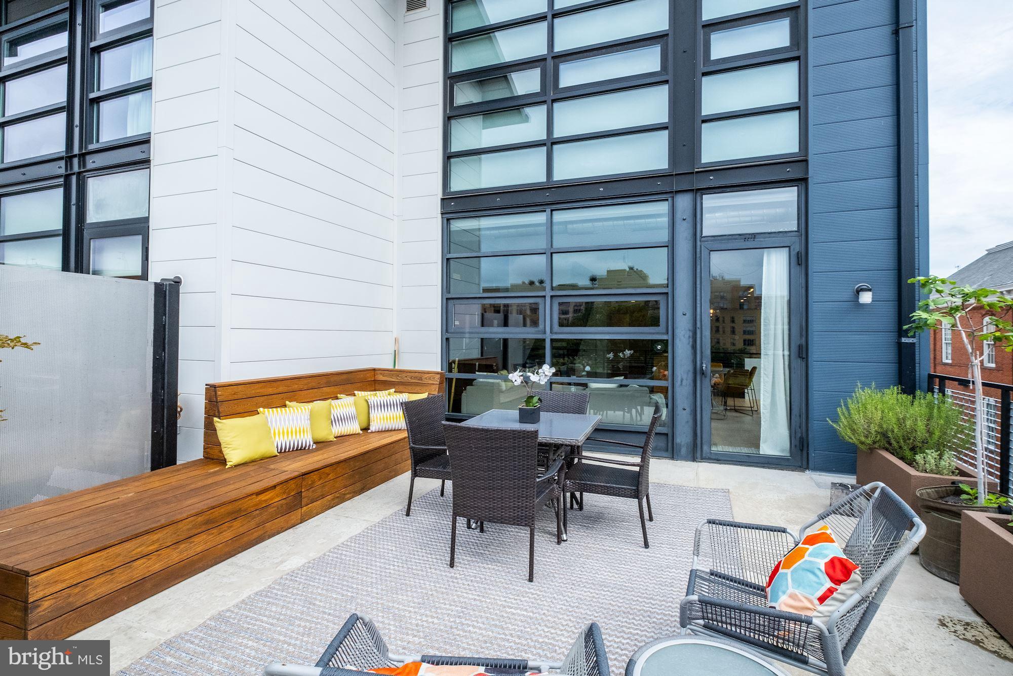 2125 14th Street Northwest, Unit 315W Washington, DC 20009 - Photo 12 of 35 a outdoor living space with patio furniture