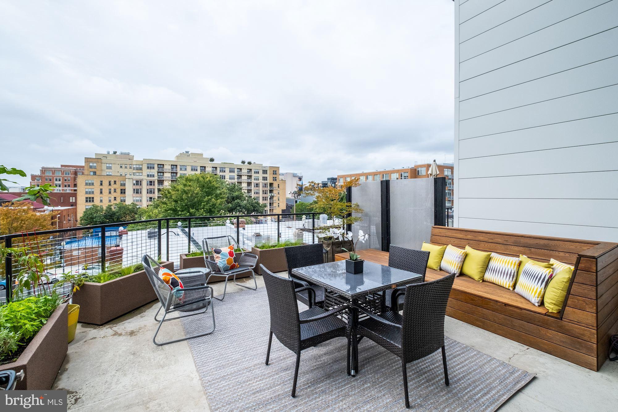 2125 14th Street Northwest, Unit 315W Washington, DC 20009 - Photo 13 of 35 a view of a terrace with furniture