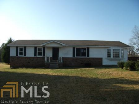 34 Mimosa Road Griffin, GA 30223 - Photo 1 of 1 a front view of a house with a yard