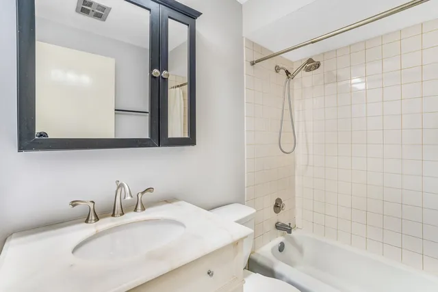 a bathroom with a sink and a bathtub