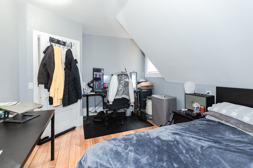 68 Spring Street Holbrook, MA 02343 - Photo 18 of 21 a bed room with a bed and a desk