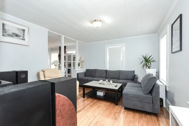 a living room with furniture and a couch