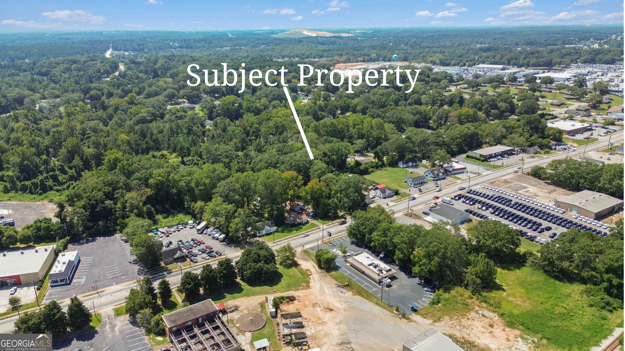 108 West May Street Winder, GA 30680 - Photo 2 of 9 a view of a city