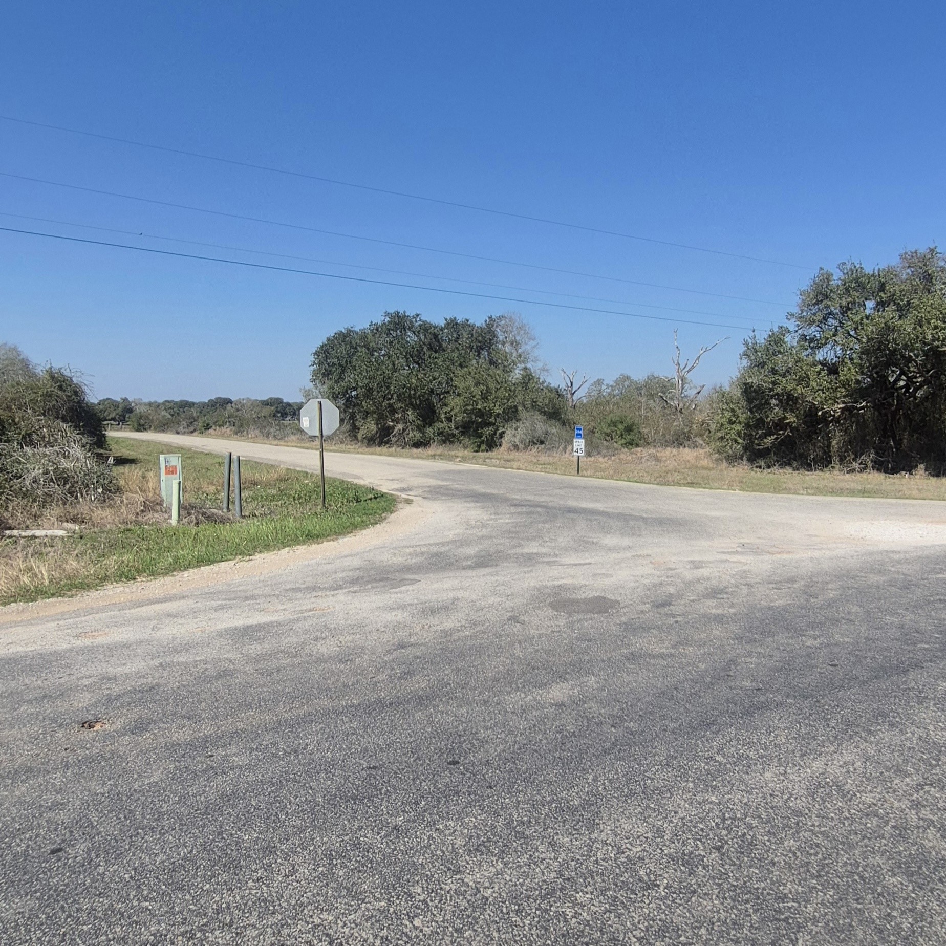 0 County Road 284 Edna, TX 77957 - Photo 2 of 5 a view of a road with a building in the background