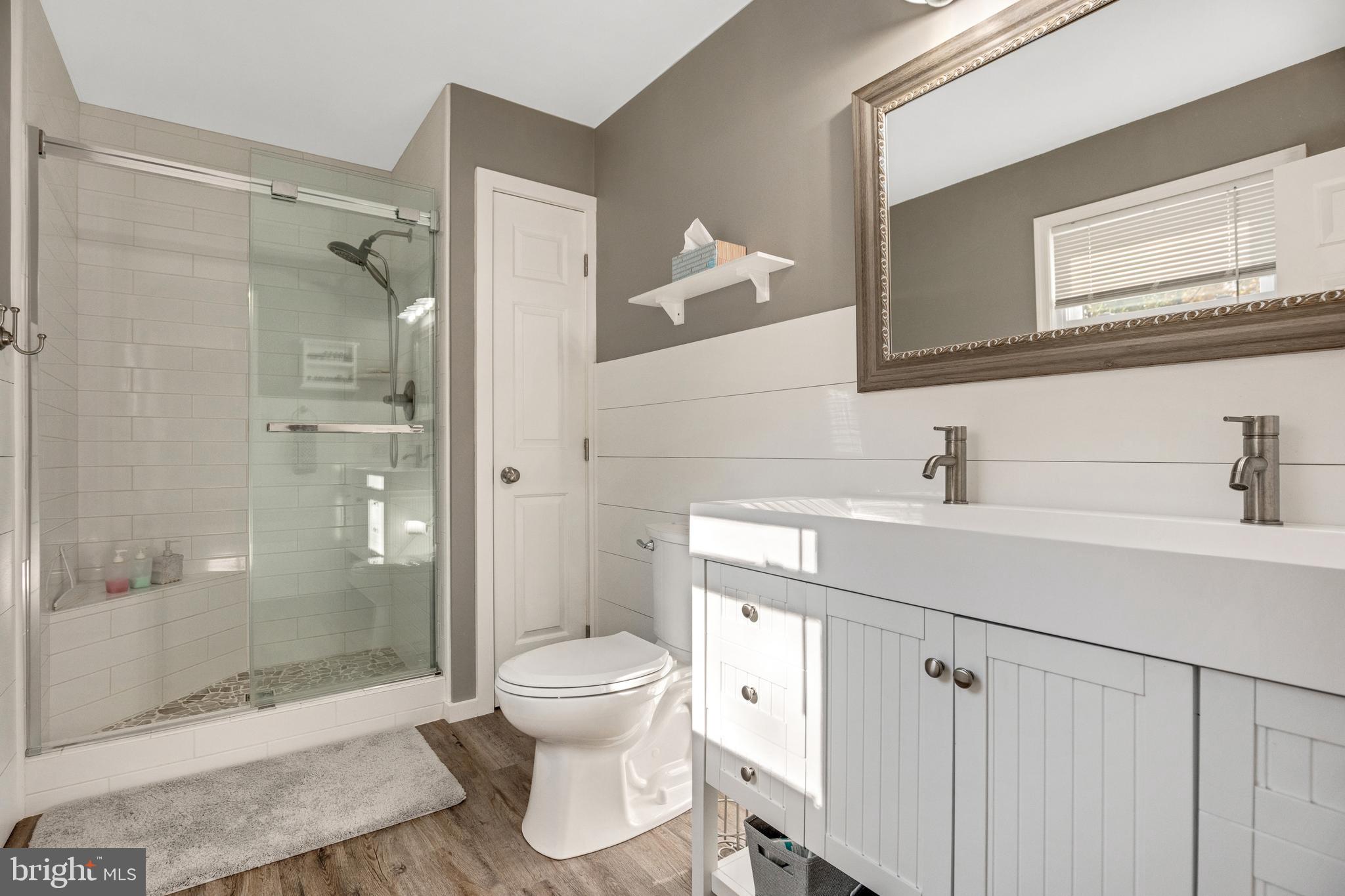 920 Carson Road Huntingtown, MD 20639 - Photo 10 of 32 a bathroom with a sink toilet and shower