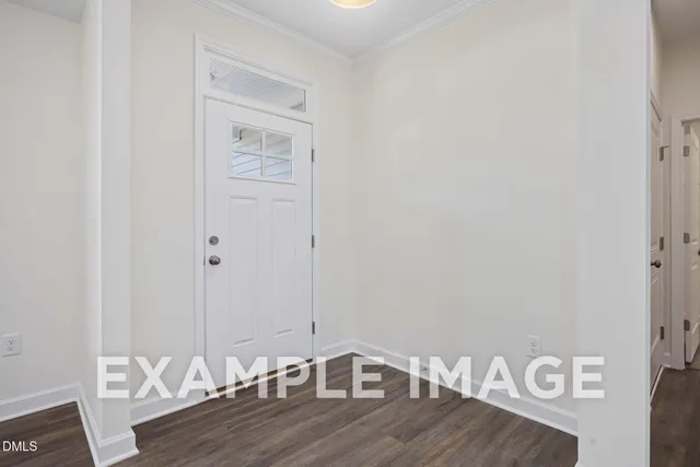 a view of a livingroom with wooden floor