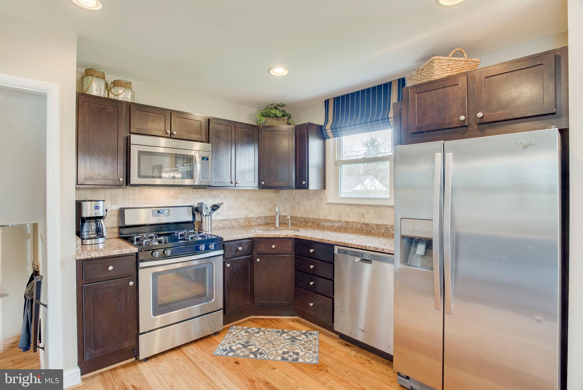 202 Rollingdale Road Baltimore, MD 21228 - Photo 21 of 47 Custom blind over the sink w/view of yard