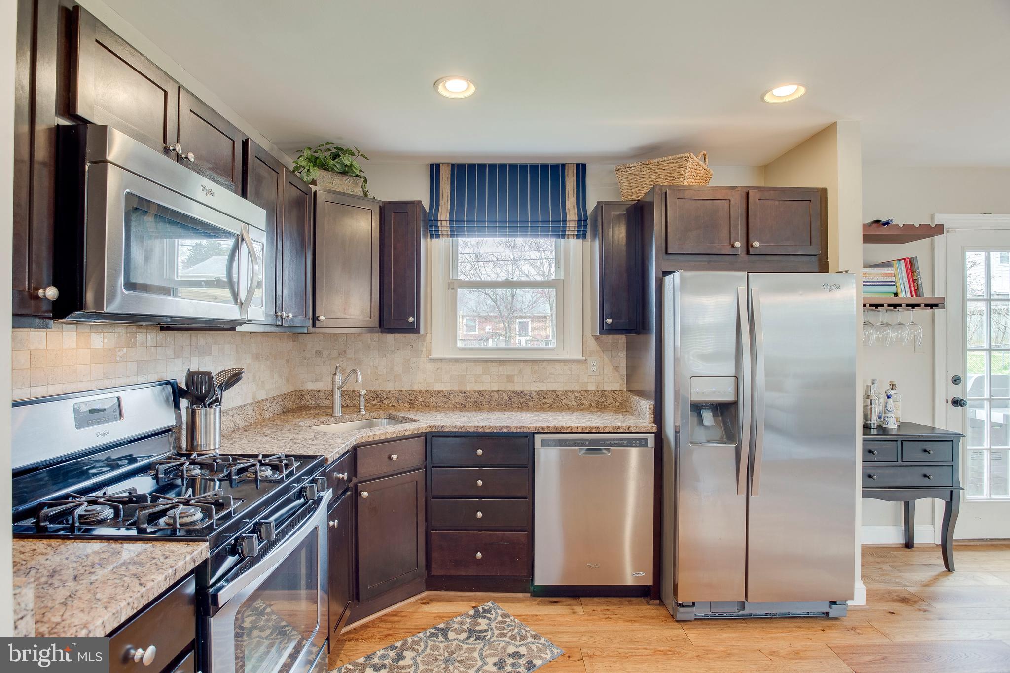 202 Rollingdale Road Baltimore, MD 21228 - Photo 25 of 47 S/S appliances + gas range