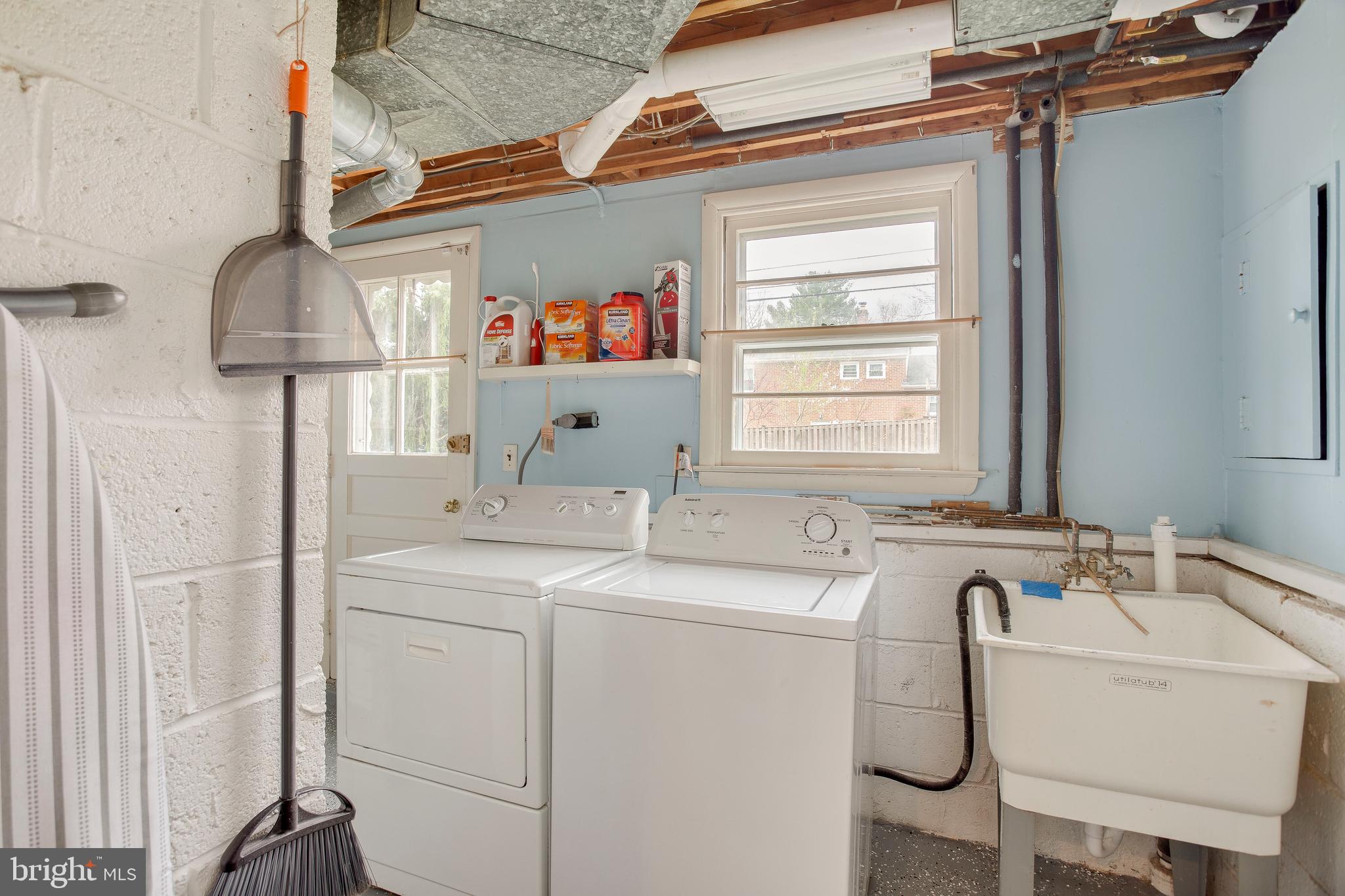 202 Rollingdale Road Baltimore, MD 21228 - Photo 40 of 47 Laundry room with newer flooring + door to yard
