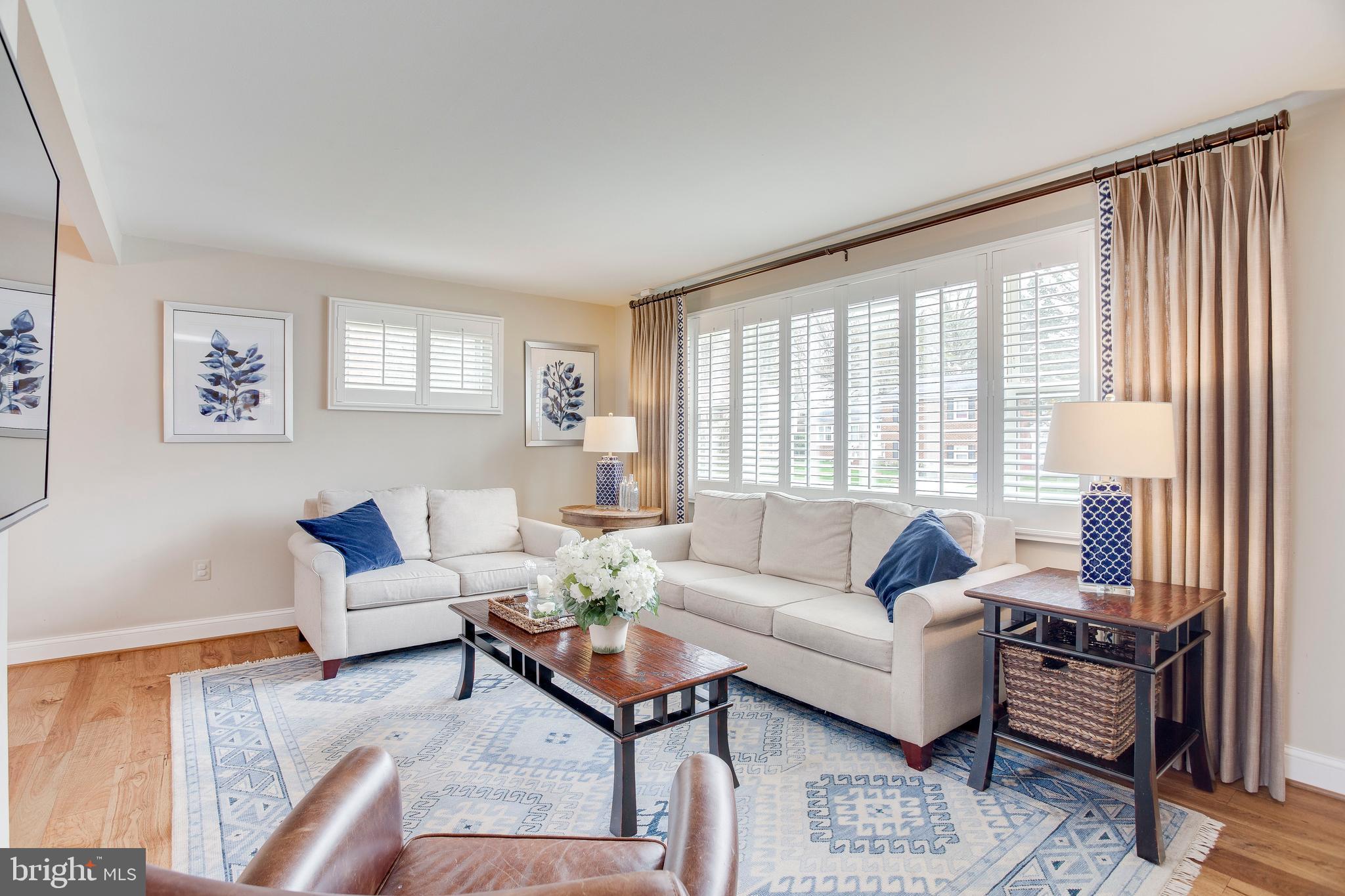 202 Rollingdale Road Baltimore, MD 21228 - Photo 10 of 47 Custom drapes accent this lovely room