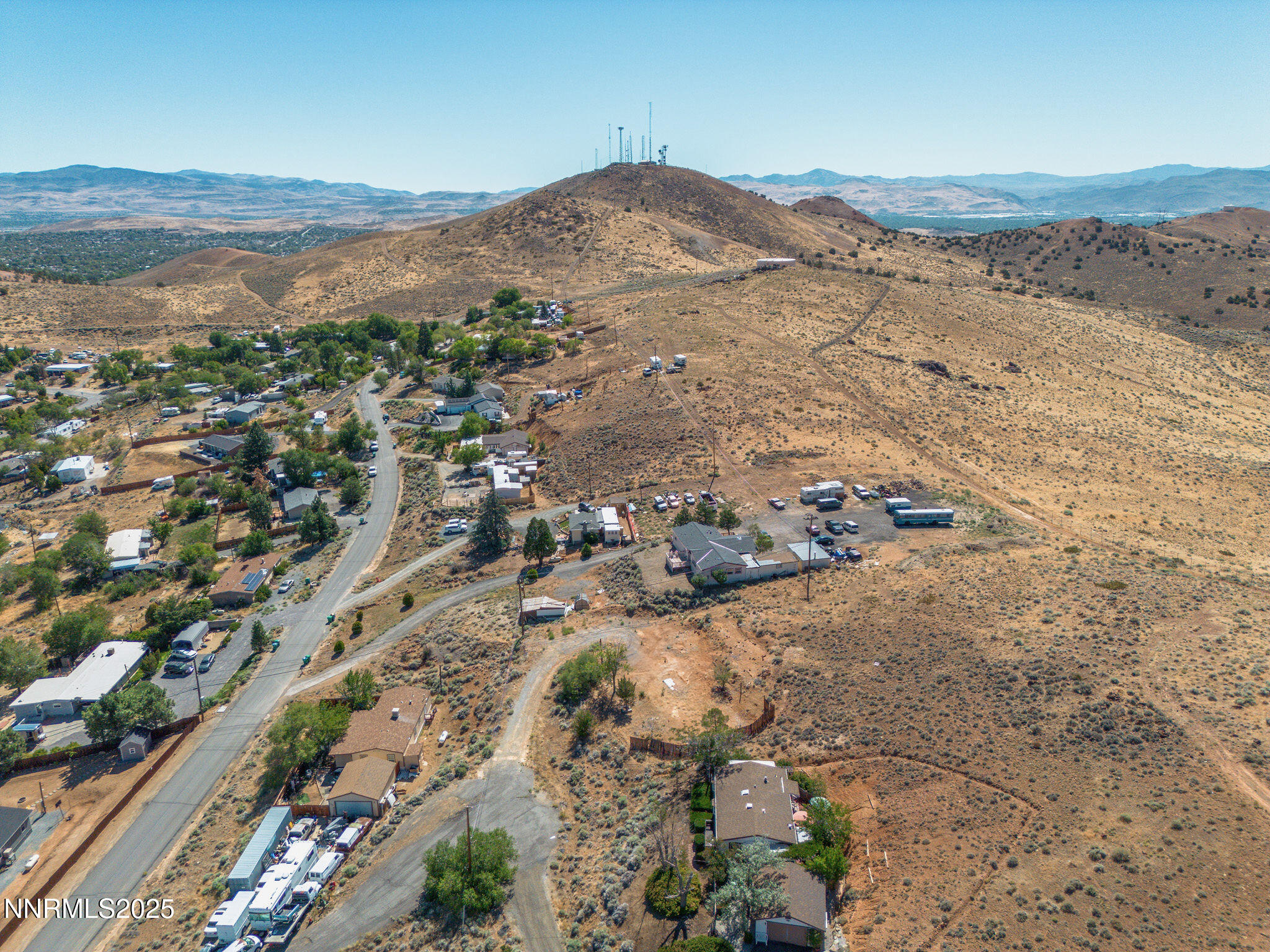 1606 Sagehen Lane Reno, NV 89506 - Photo 15 of 19 an aerial view of mountain with an ocean beach