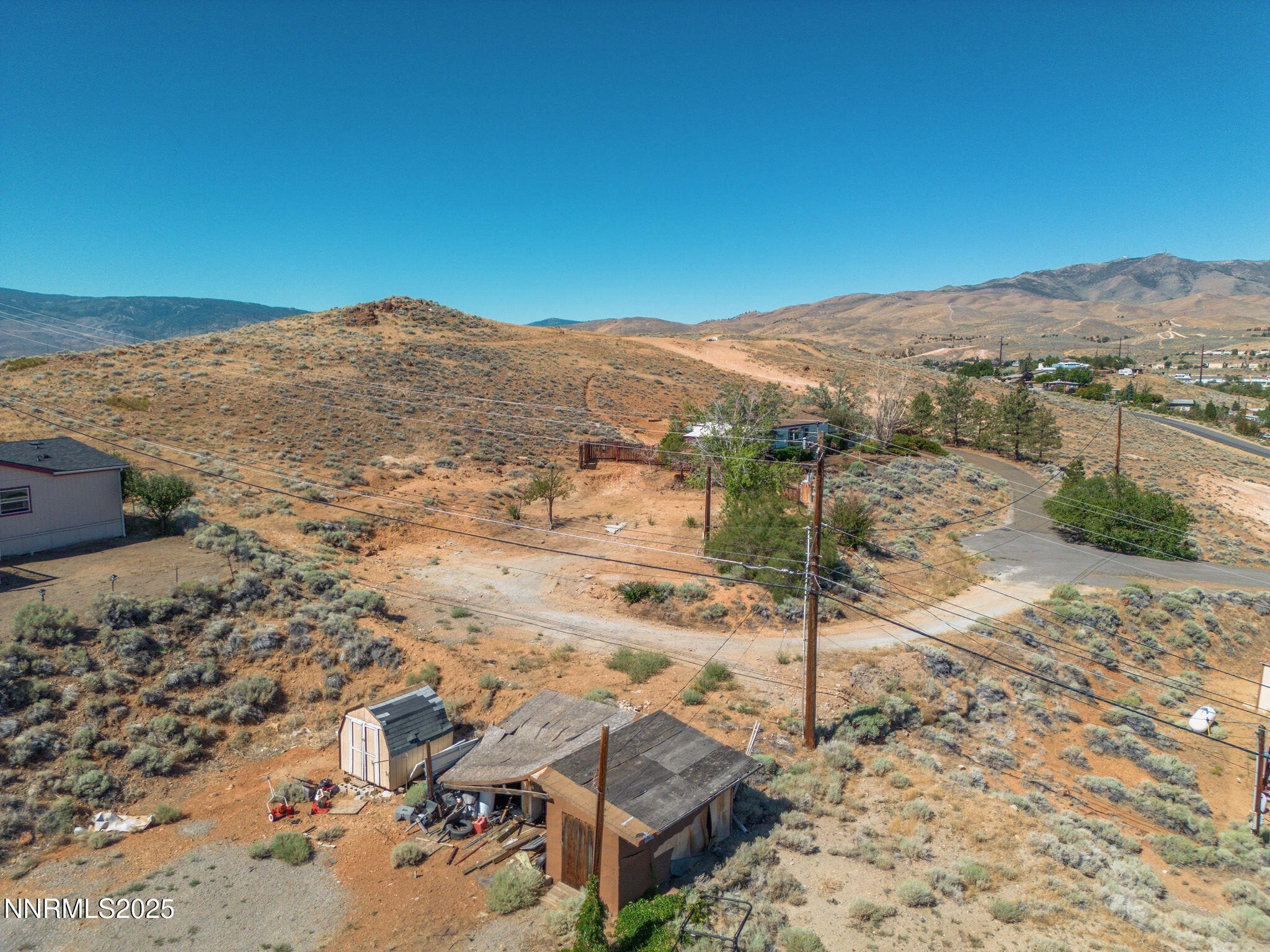 1606 Sagehen Lane Reno, NV 89506 - Photo 18 of 19 a view of a mountain with a mountain in the background