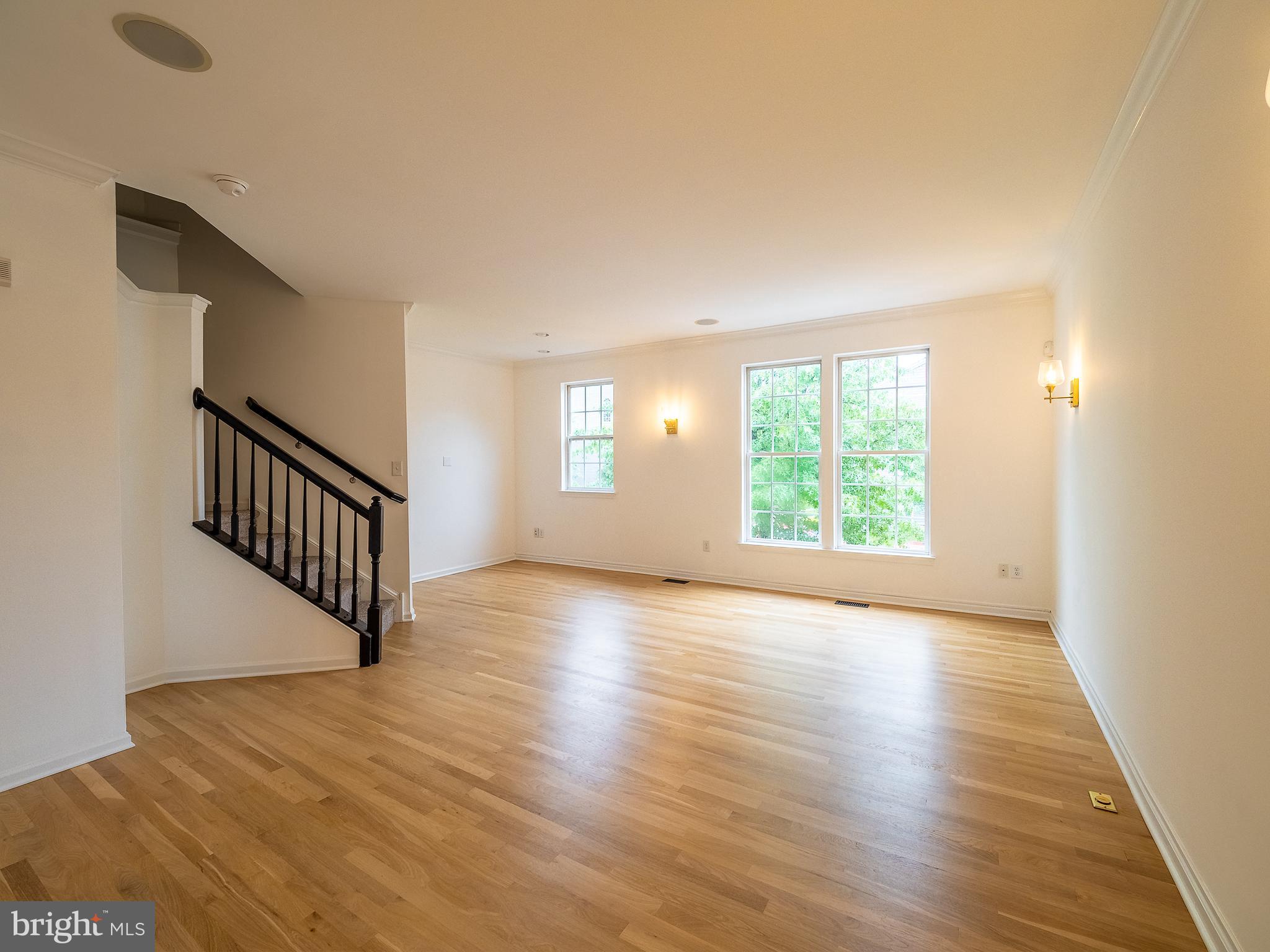 70 River Lane Delanco, NJ 08075 - Photo 12 of 35 an empty room with wooden floor and windows