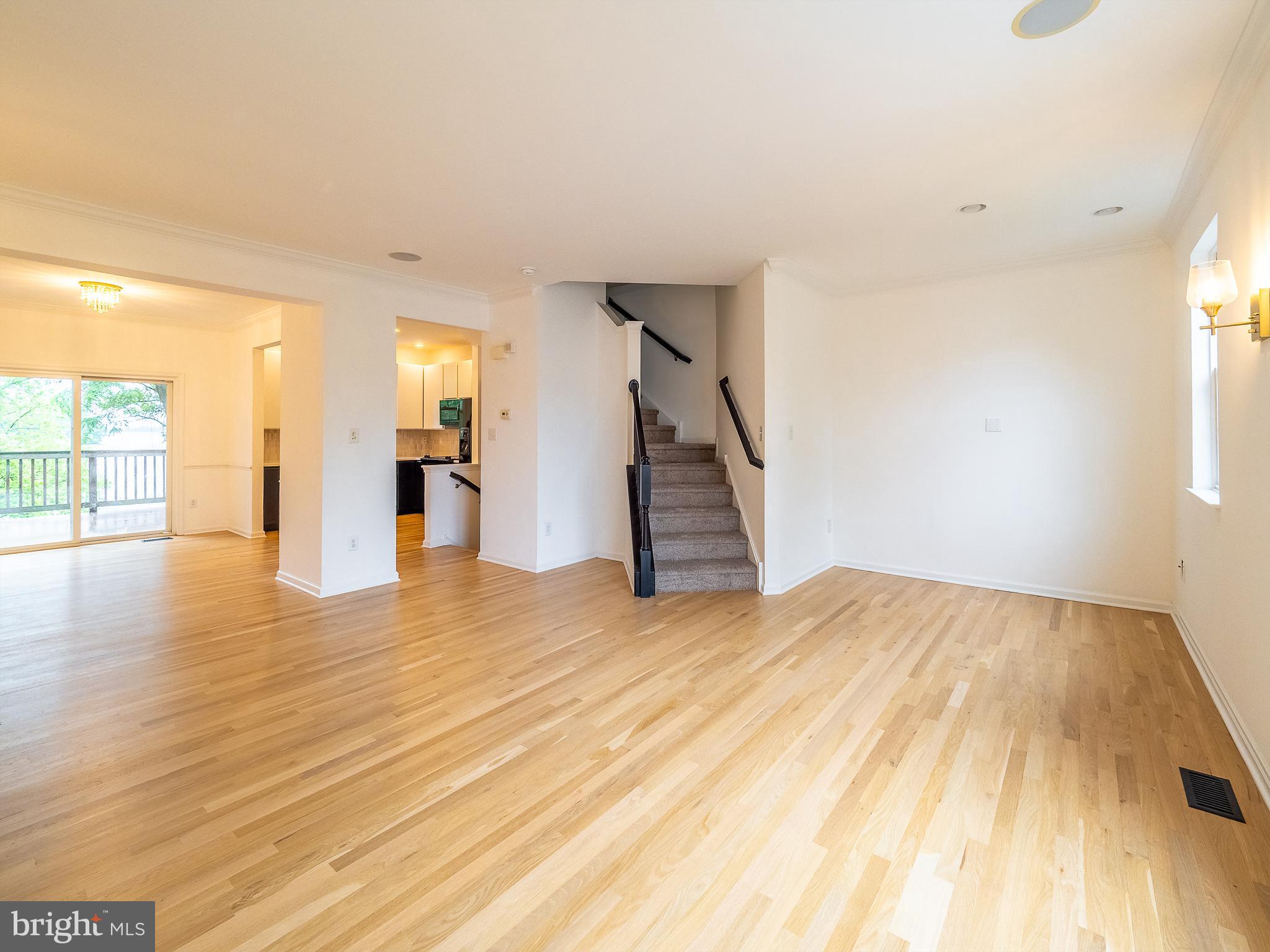 70 River Lane Delanco, NJ 08075 - Photo 13 of 35 a view of an empty room with wooden floor and a window