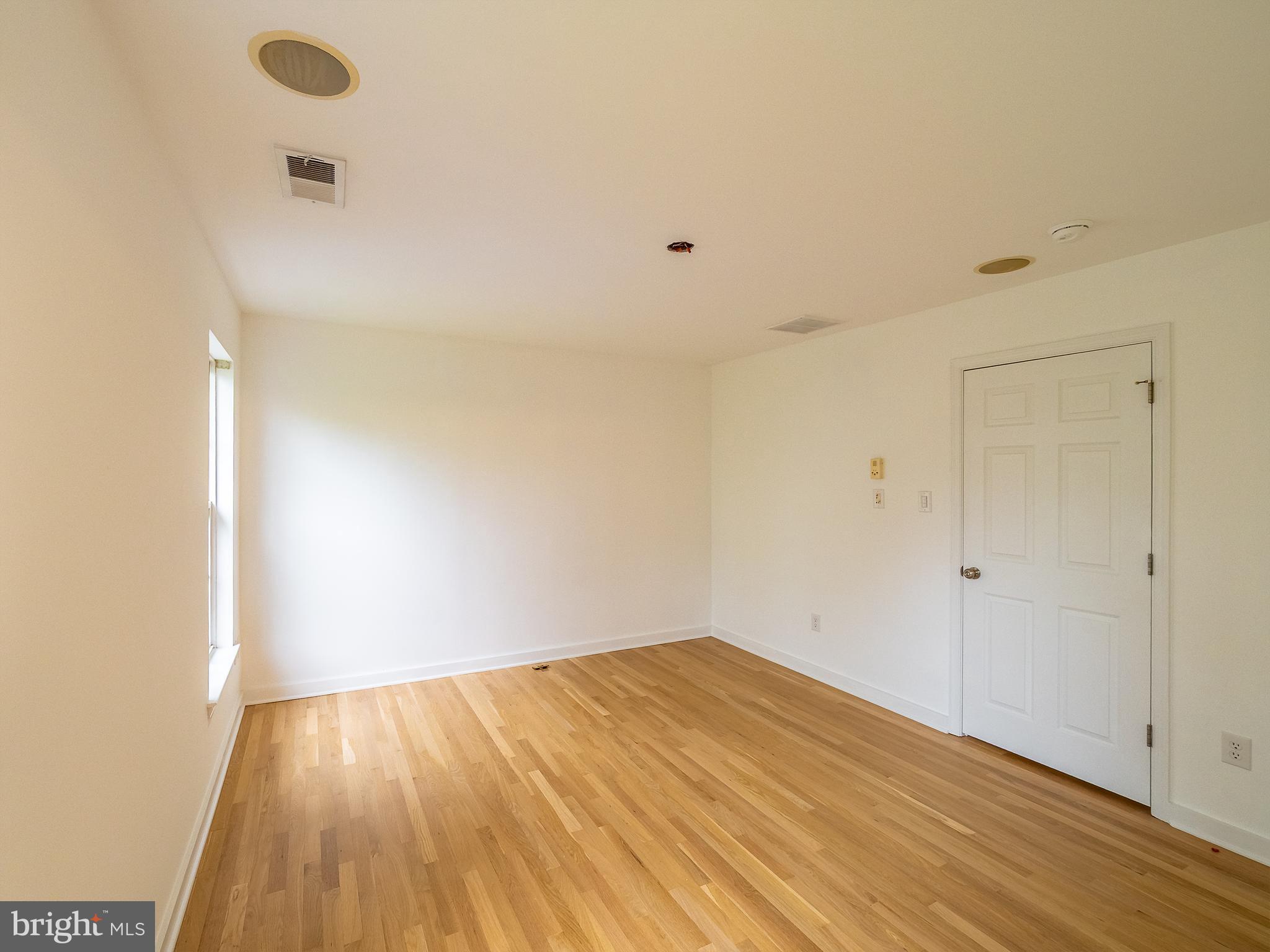 70 River Lane Delanco, NJ 08075 - Photo 19 of 35 a view of empty room with wooden floor