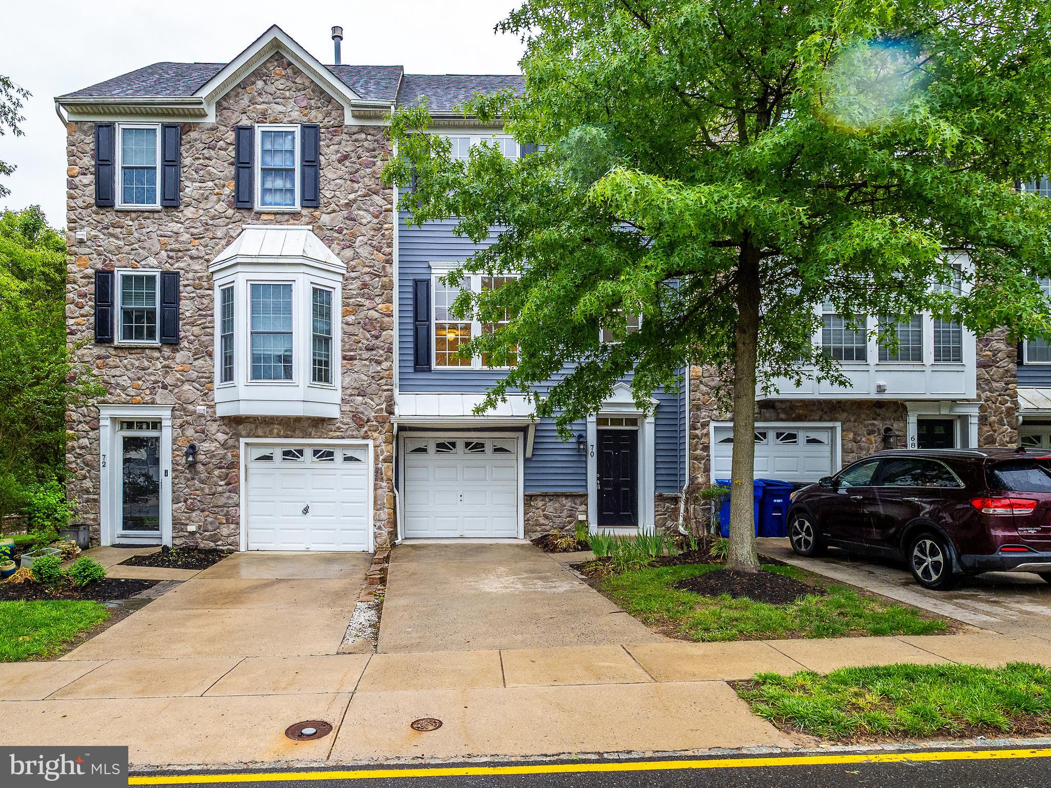 70 River Lane Delanco, NJ 08075 - Photo 31 of 35 a front view of a house with a garden