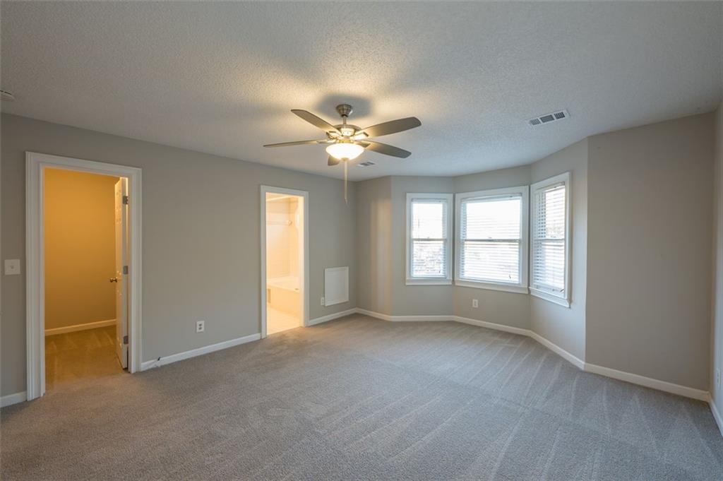 4648 Calumet Circle Northwest Duluth, GA 30096 - Photo 26 of 37 a view of an empty room with a window