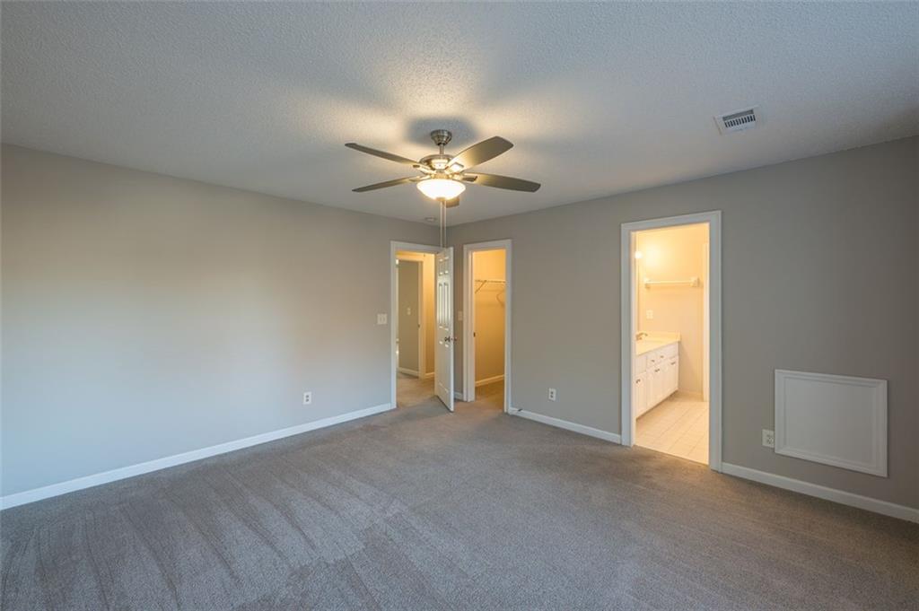 4648 Calumet Circle Northwest Duluth, GA 30096 - Photo 27 of 37 a view of an empty room with a window