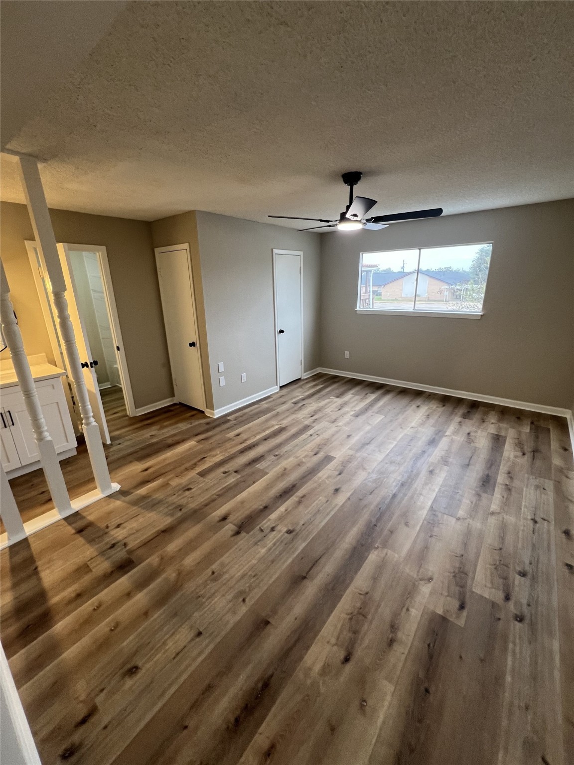 1310 Town Circle, Unit 1 Baytown, TX 77520 - Photo 14 of 21 a view of empty room with windows