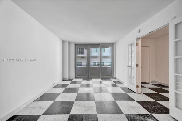 a view of a black and white checkered floor