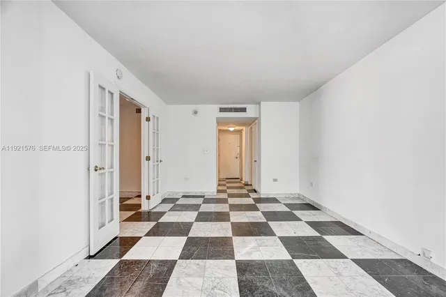 a view of a black and white checkered floor with a black white checkered floor