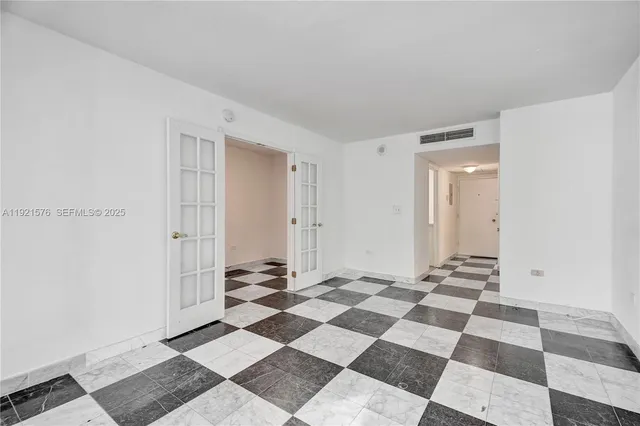 a view of a black and white checkered floor