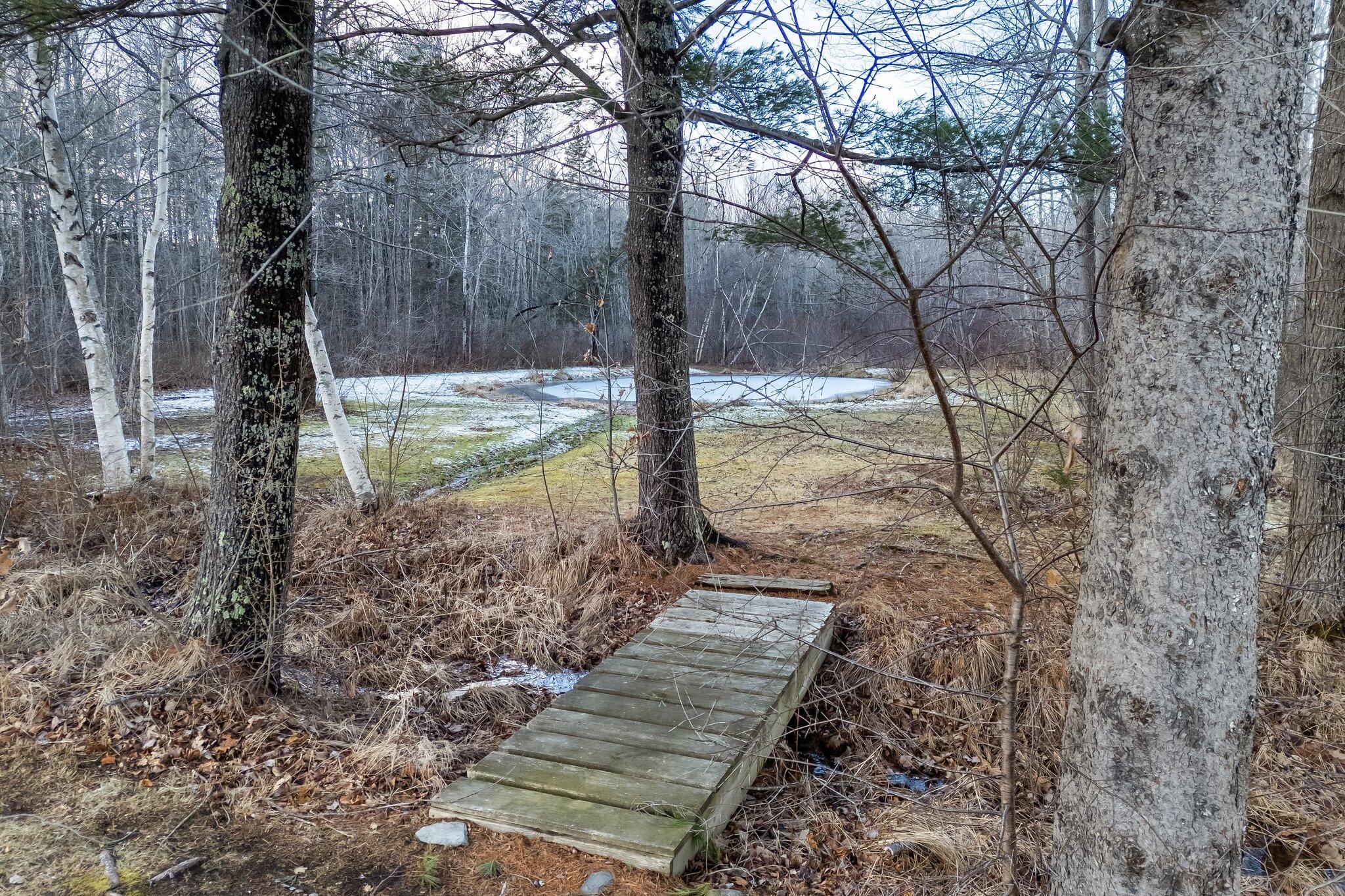 64 Old County Road Hampden, ME 04444 - Photo 44 of 57 Bridge to pond