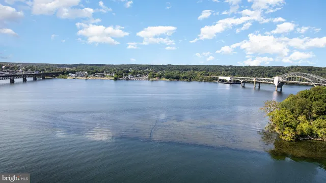 a view of a lake with a city