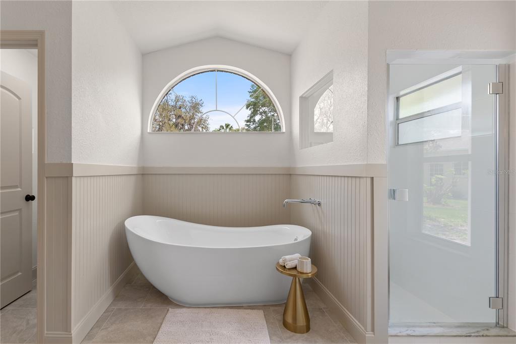 419 Silas Court Spring Hill, FL 34609 - Photo 29 of 56 a white toilet sitting next to a bathroom sink