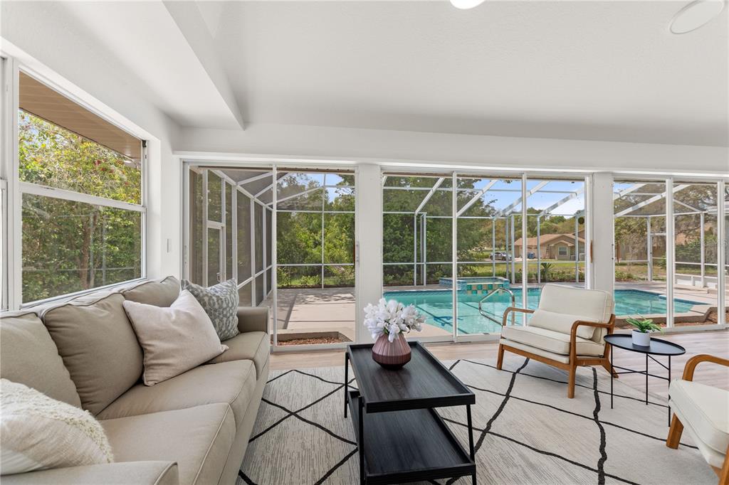 419 Silas Court Spring Hill, FL 34609 - Photo 33 of 56 a living room with furniture and a window