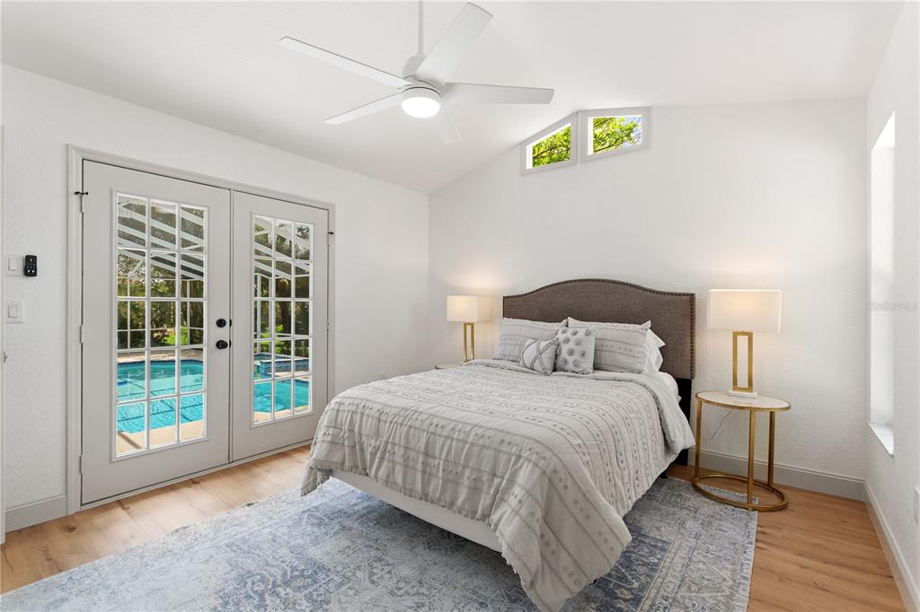 419 Silas Court Spring Hill, FL 34609 - Photo 41 of 56 a bedroom with a bed and a window