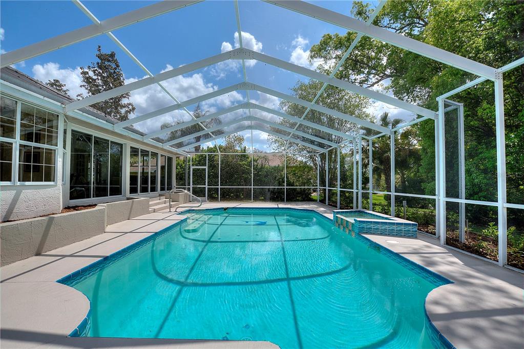 419 Silas Court Spring Hill, FL 34609 - Photo 44 of 56 a view of a house with a swimming pool