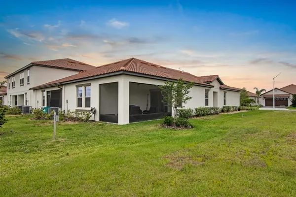 a house with garden in front of it