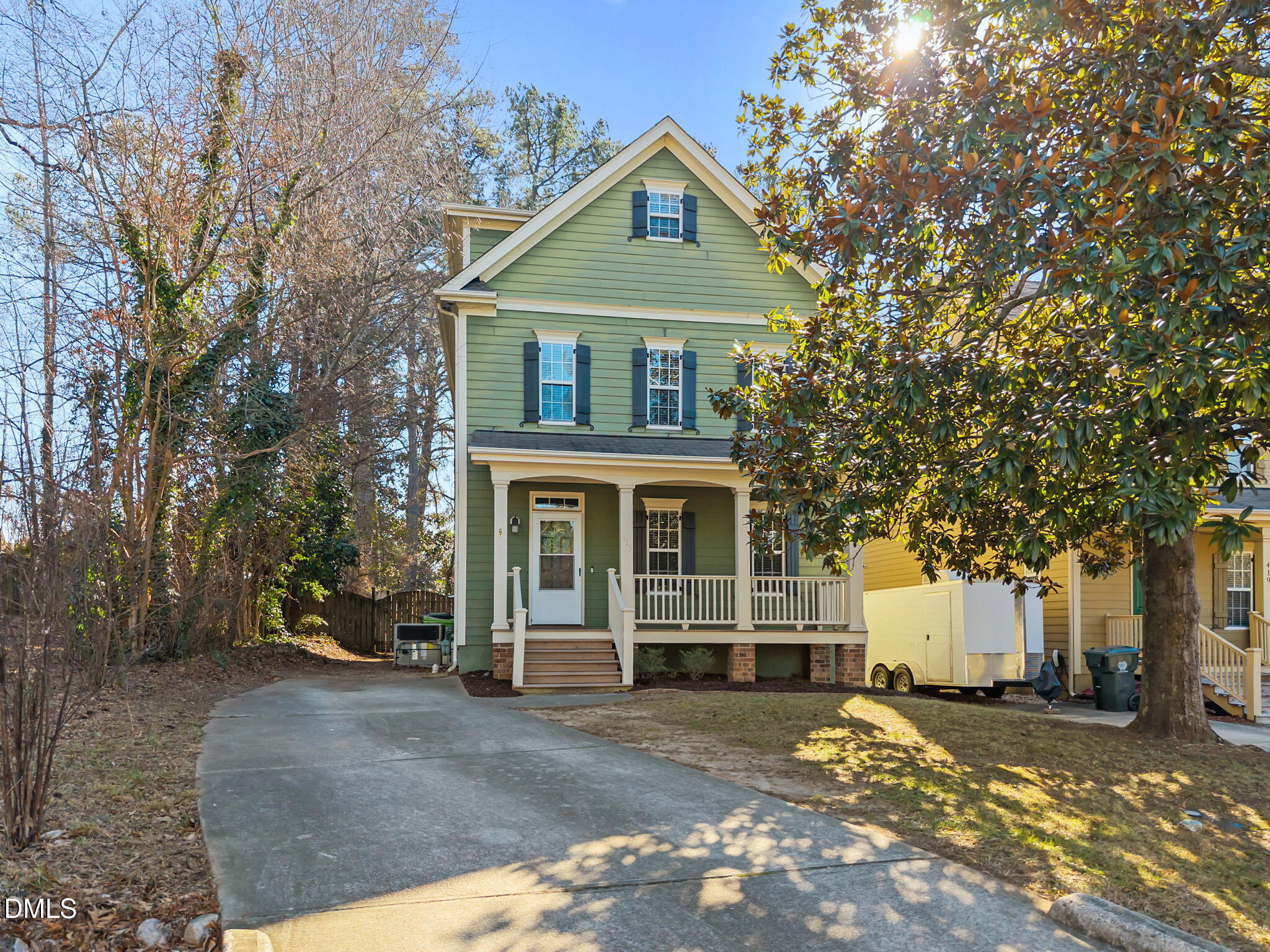 415 Carolina Avenue Raleigh, NC 27606 - Photo 12 of 58 a front view of a house with a yard