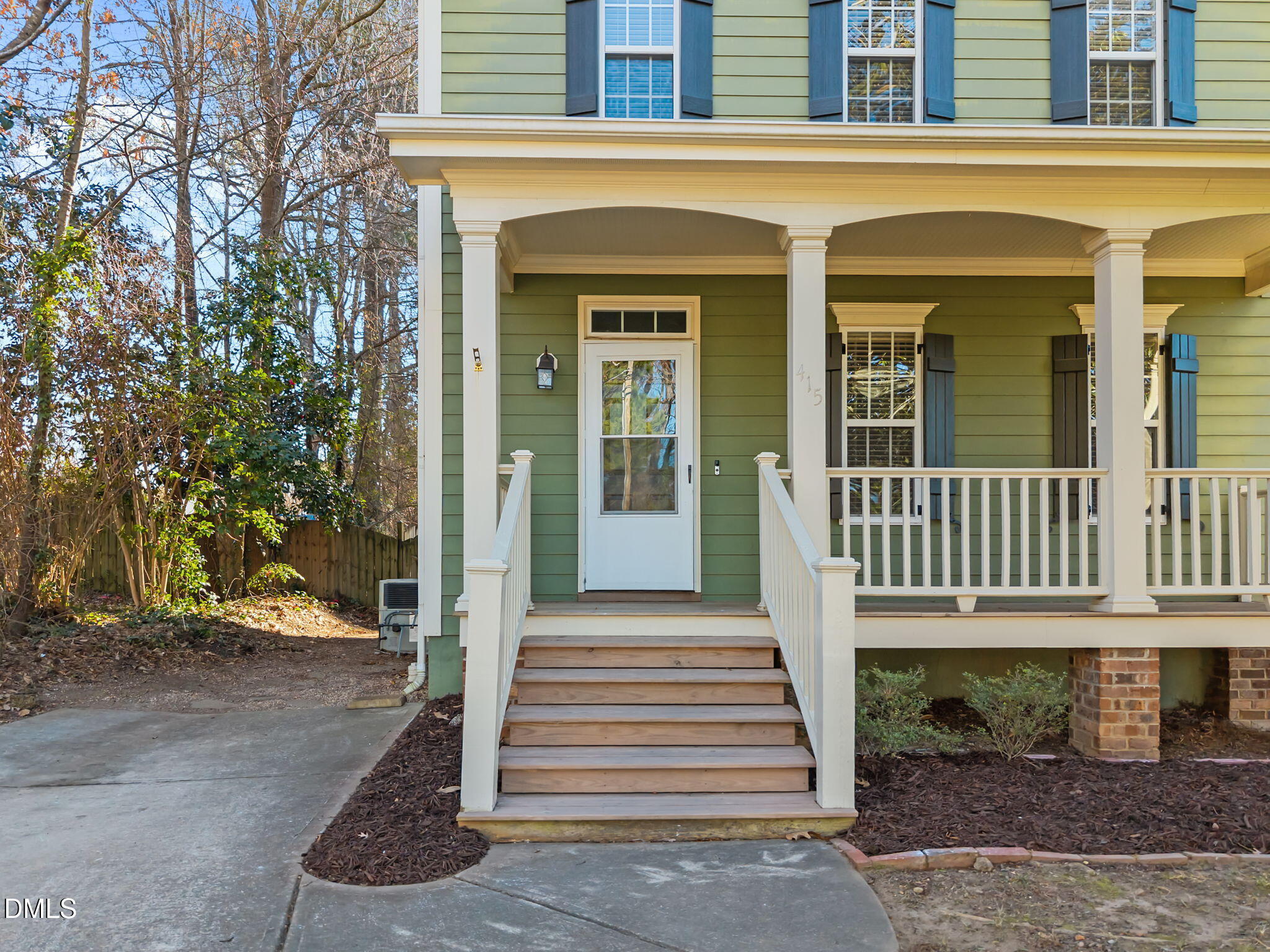 415 Carolina Avenue Raleigh, NC 27606 - Photo 14 of 58 a front view of a house with a porch
