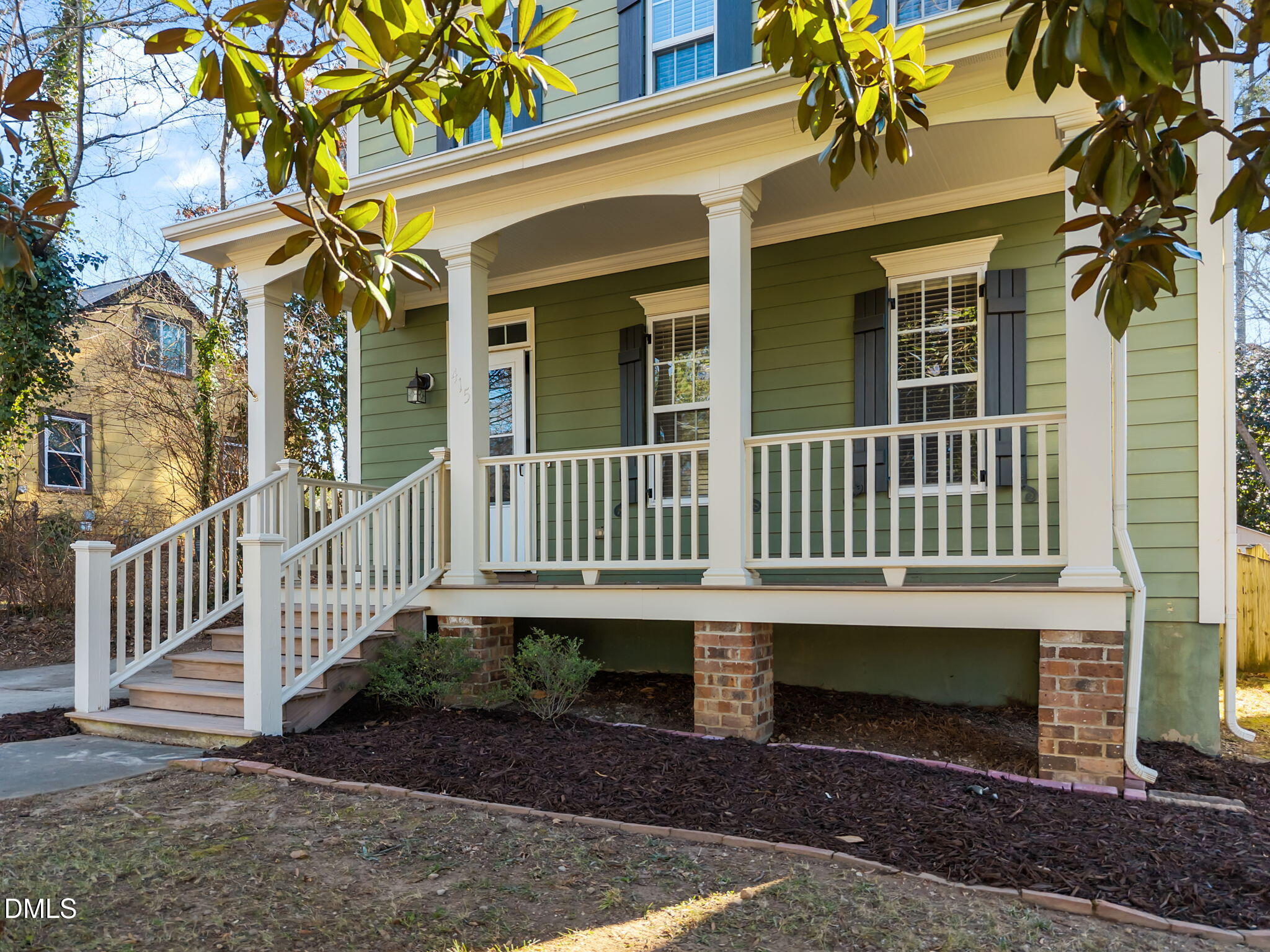 415 Carolina Avenue Raleigh, NC 27606 - Photo 15 of 58 front view of a house with a yard