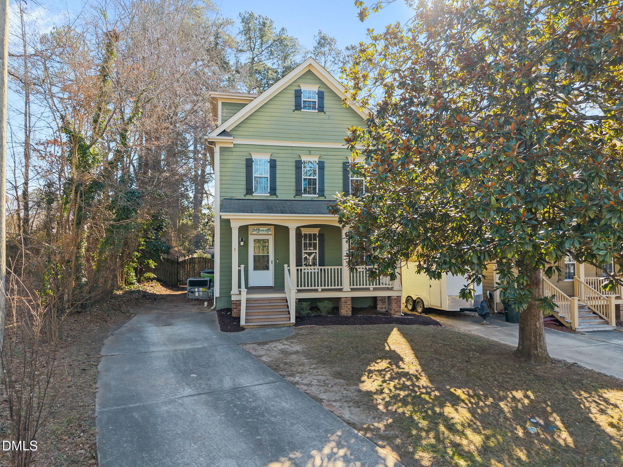 415 Carolina Avenue Raleigh, NC 27606 - Photo 16 of 58 a front view of a house with a yard