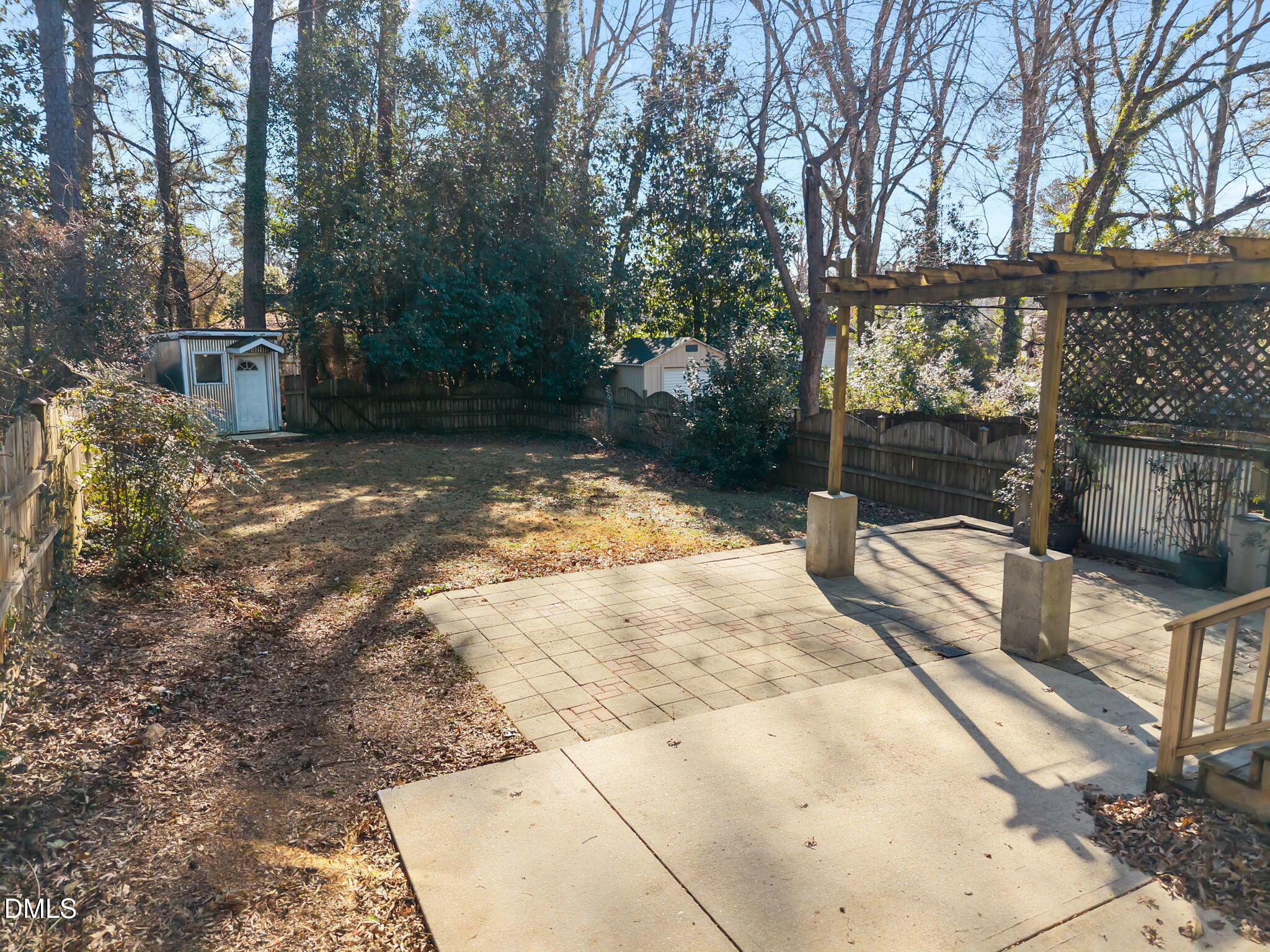 415 Carolina Avenue Raleigh, NC 27606 - Photo 17 of 58 a view of a yard with large trees