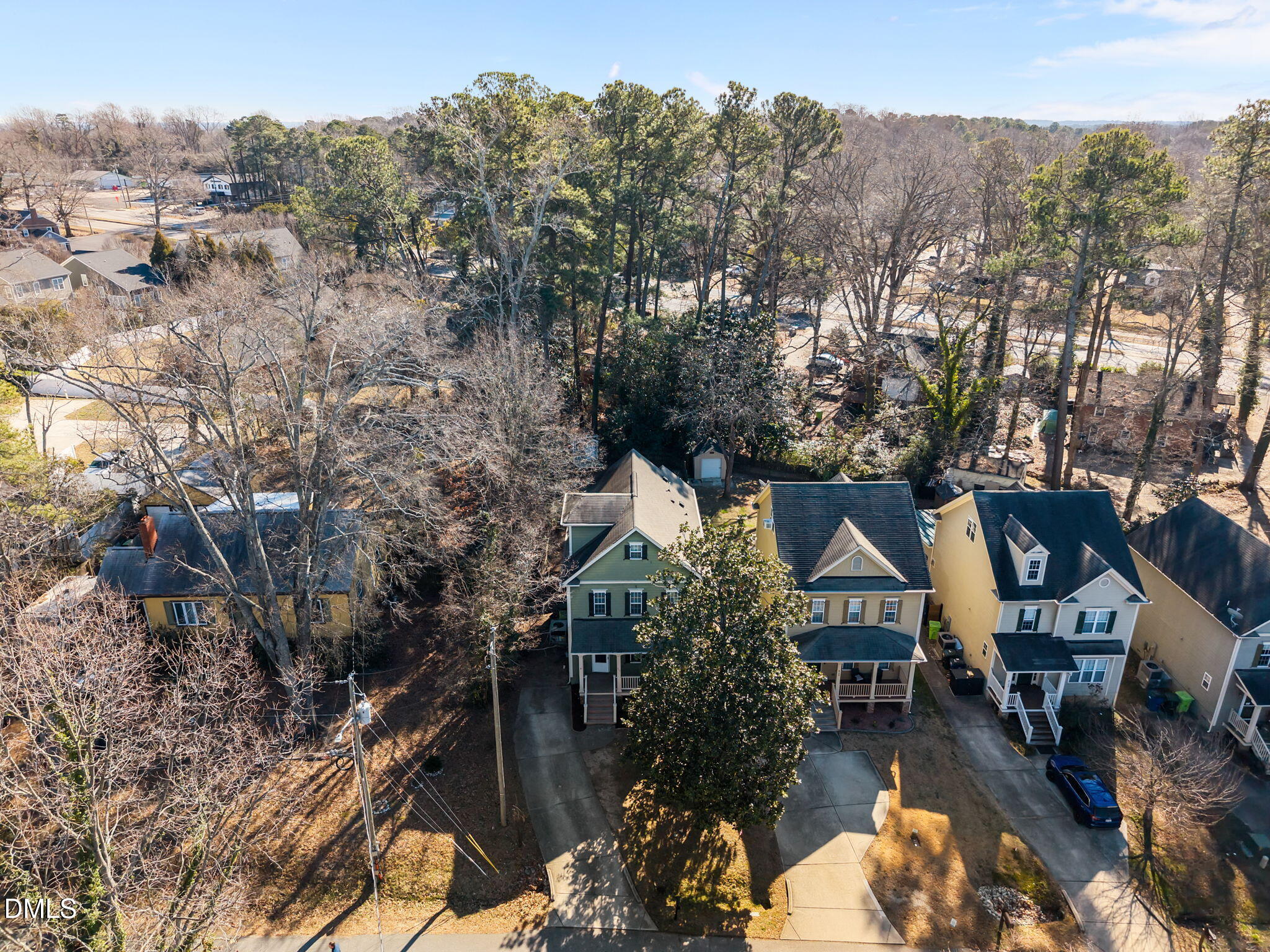 415 Carolina Avenue Raleigh, NC 27606 - Photo 24 of 58 an aerial view of a house with a mountain