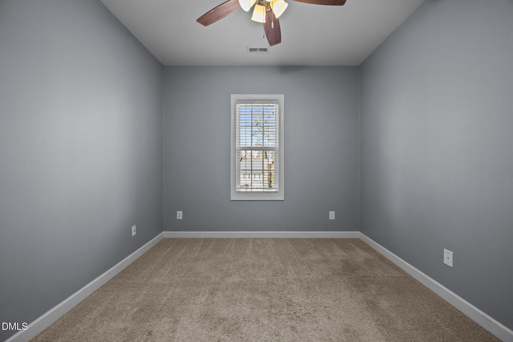 415 Carolina Avenue Raleigh, NC 27606 - Photo 27 of 58 an empty room with a window