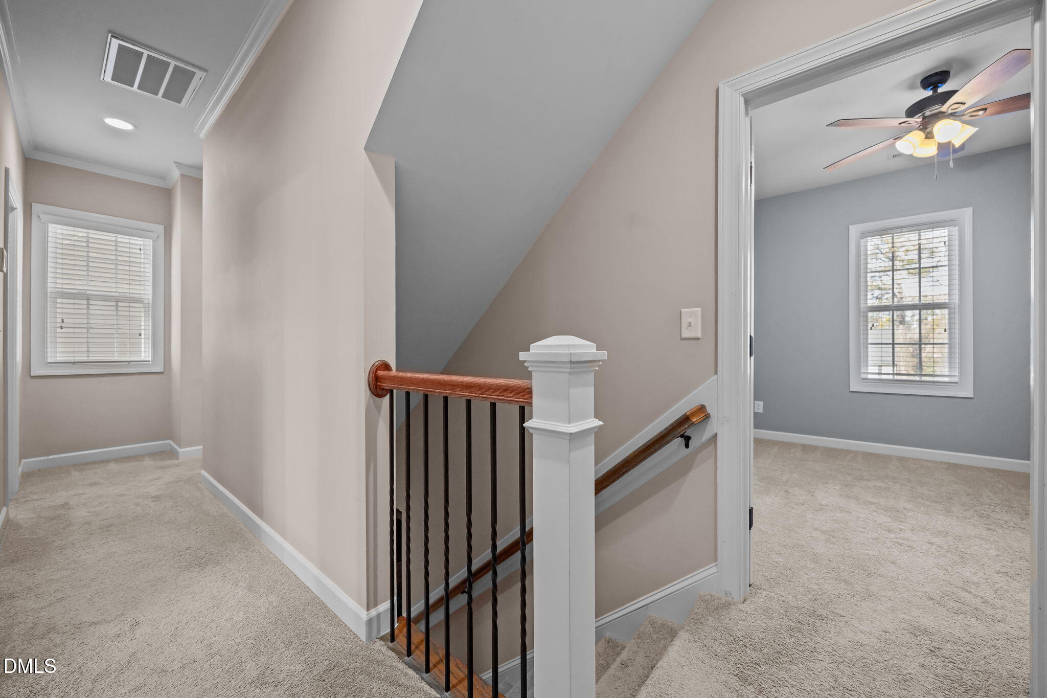 415 Carolina Avenue Raleigh, NC 27606 - Photo 28 of 58 a view of a hallway with entryway and stairs
