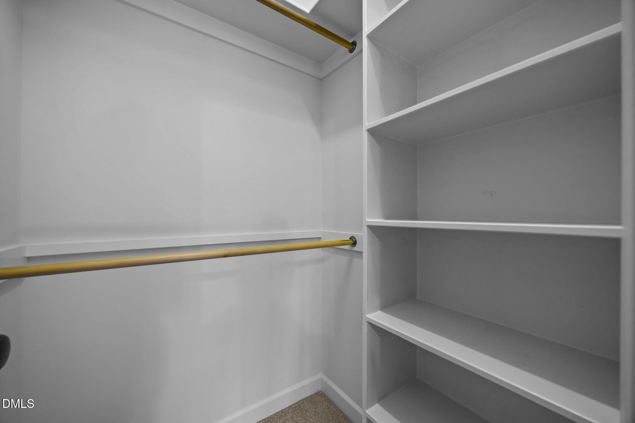 415 Carolina Avenue Raleigh, NC 27606 - Photo 31 of 58 a view of an empty walk in closet