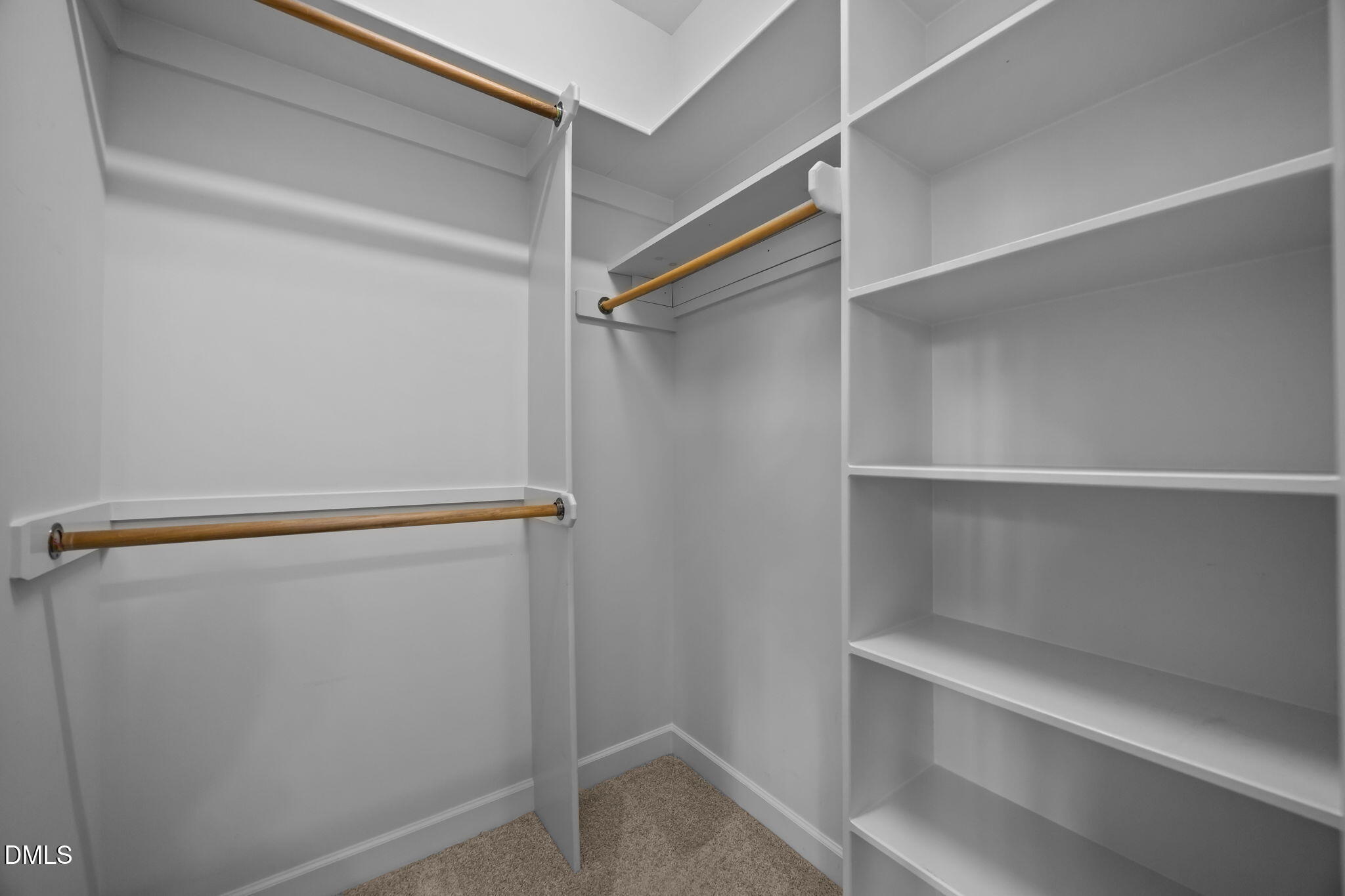 415 Carolina Avenue Raleigh, NC 27606 - Photo 32 of 58 a view of an empty walk in closet