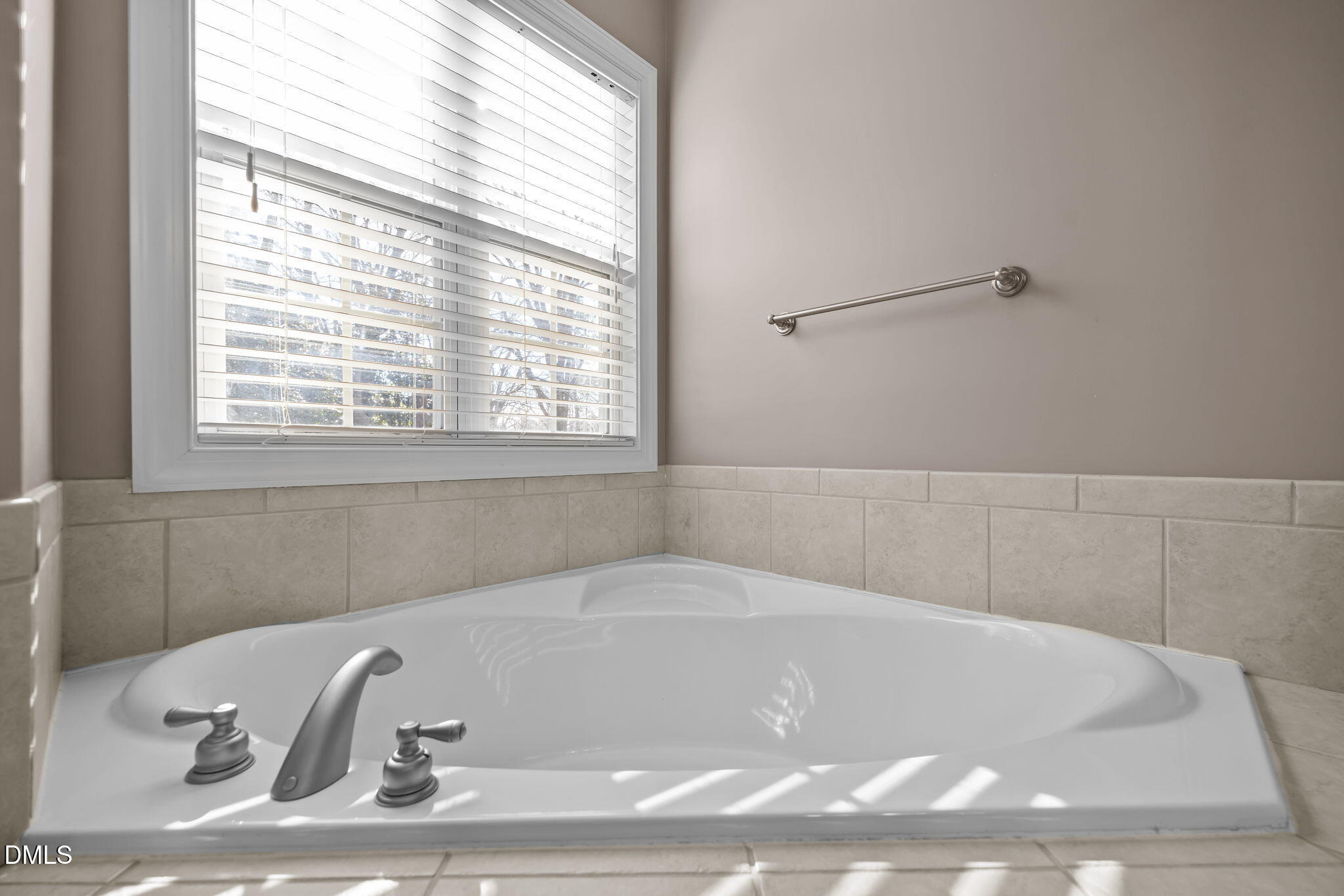 415 Carolina Avenue Raleigh, NC 27606 - Photo 34 of 58 a white bath tub sitting in a bathroom