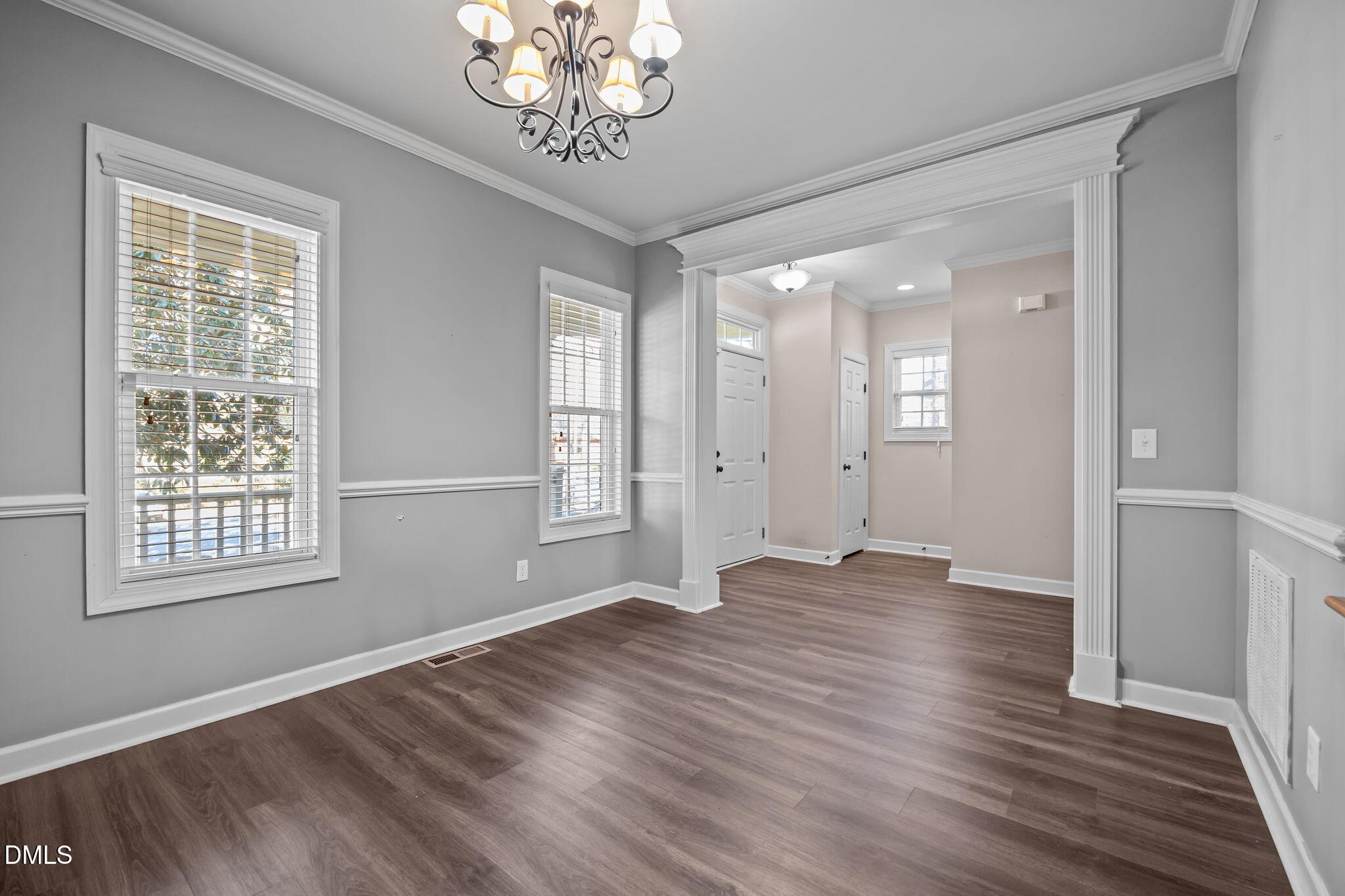 415 Carolina Avenue Raleigh, NC 27606 - Photo 40 of 58 a view of empty room with wooden floor and fan