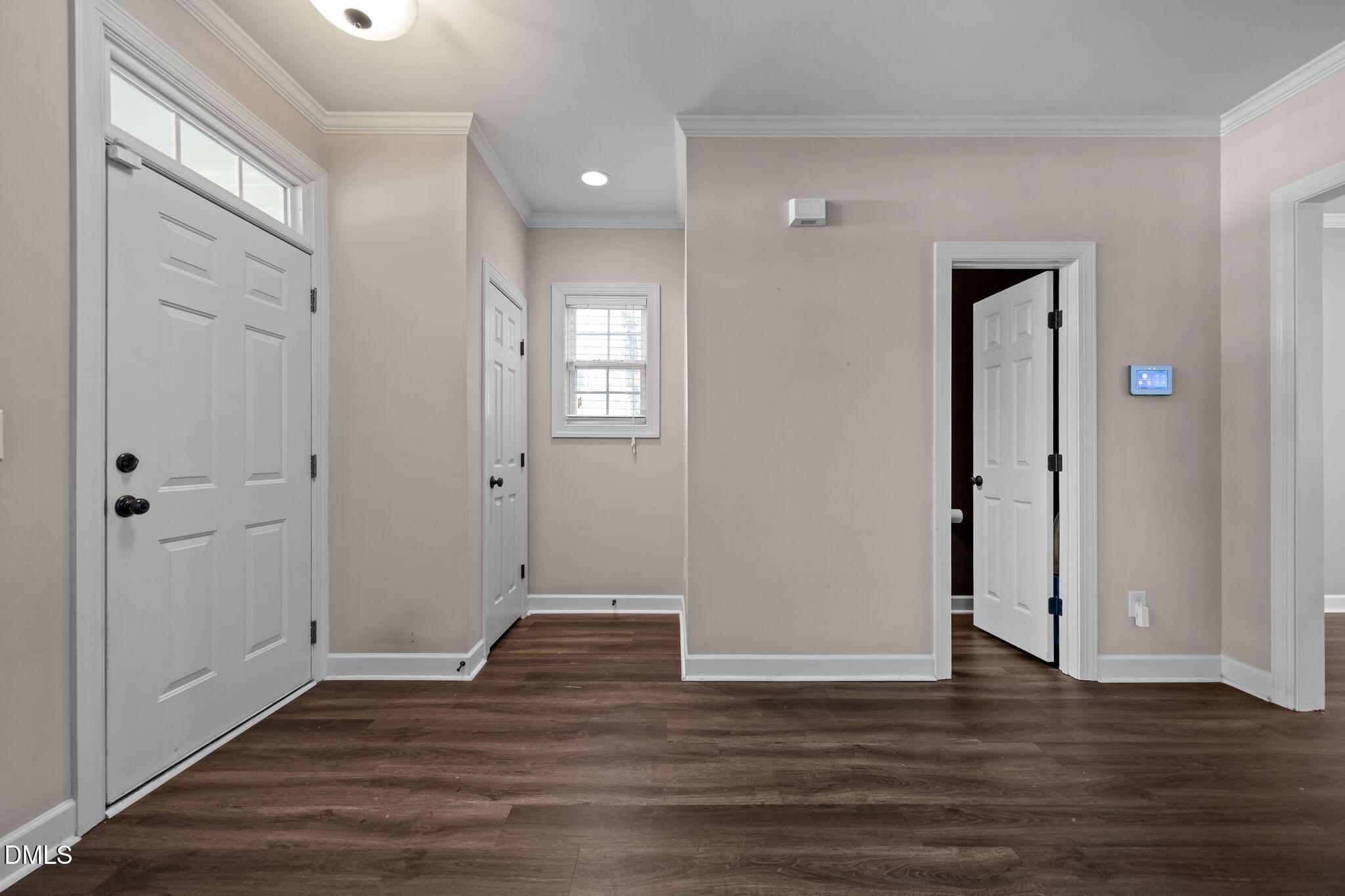 415 Carolina Avenue Raleigh, NC 27606 - Photo 43 of 58 a view of an empty room with wooden floor and closet