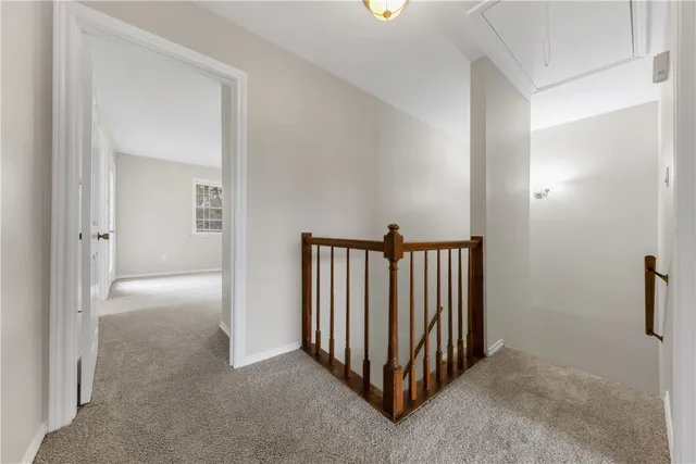 a view of a hallway with closet area